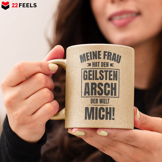 22Feels® Ehemann Geschenk zum Hochzeitstag, Valentinstag etc. - Glitzertasse mit Spruch: Geilster A'sch (Gold, 320ml)-Glitzertasse Gold 320ml-22Feels